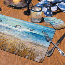 Load image into Gallery viewer, Counterart Beach Watch Hardboard Placemat, Set of 2
