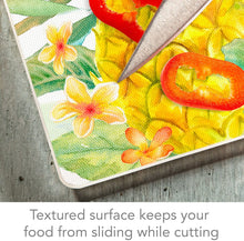 Load image into Gallery viewer, CounterArt Tropical Flowers and Pineapple Tempered Glass Counter Saver/Cutting Board 10” x 8”
