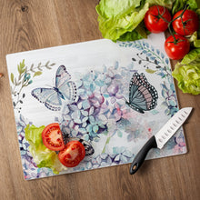 Load image into Gallery viewer, CounterArt Butterfly Hydrangea Tempered Glass Counter Saver/ Cutting Board 15 inch by 12 inch Made in the USA
