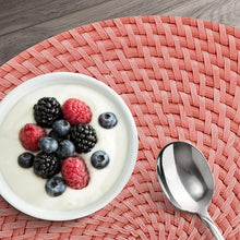Load image into Gallery viewer, CounterArt Coral and Natural Basket Weave Design Round Reversible Easy Care Plastic Placemat Set of 4 Made in The USA
