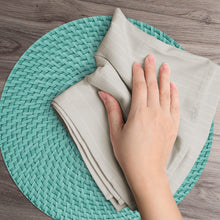 Load image into Gallery viewer, CounterArt Teal and Natural Basket Weave Design Round Reversible Easy Care Plastic Placemat Set of 4 Made in The USA
